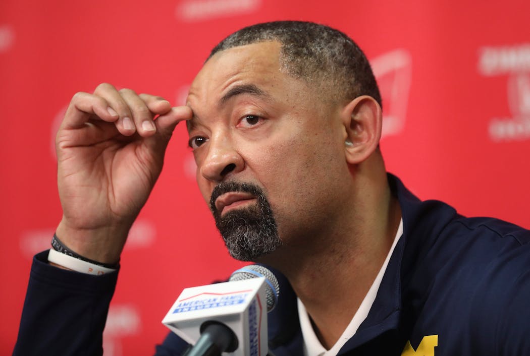 Michigan coach Juwan Howard spoke to the media after a fight broke out on the court at the end of the Michigan-Wisconsin game Sunday.