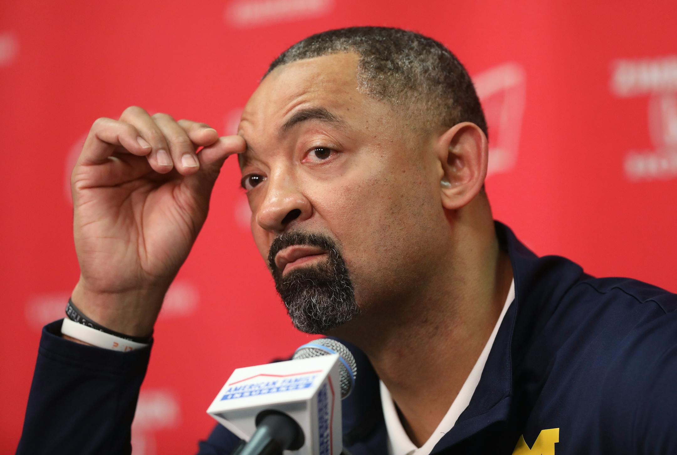 Michigan head coach Juwan Howard speaks to the media regarding a fight that broke out on the court after an NCAA college basketball game against Wisconsin in Madison, Wis., Sunday, Feb. 20, 2022. (Amber Arnold/Wisconsin State Journal via AP)