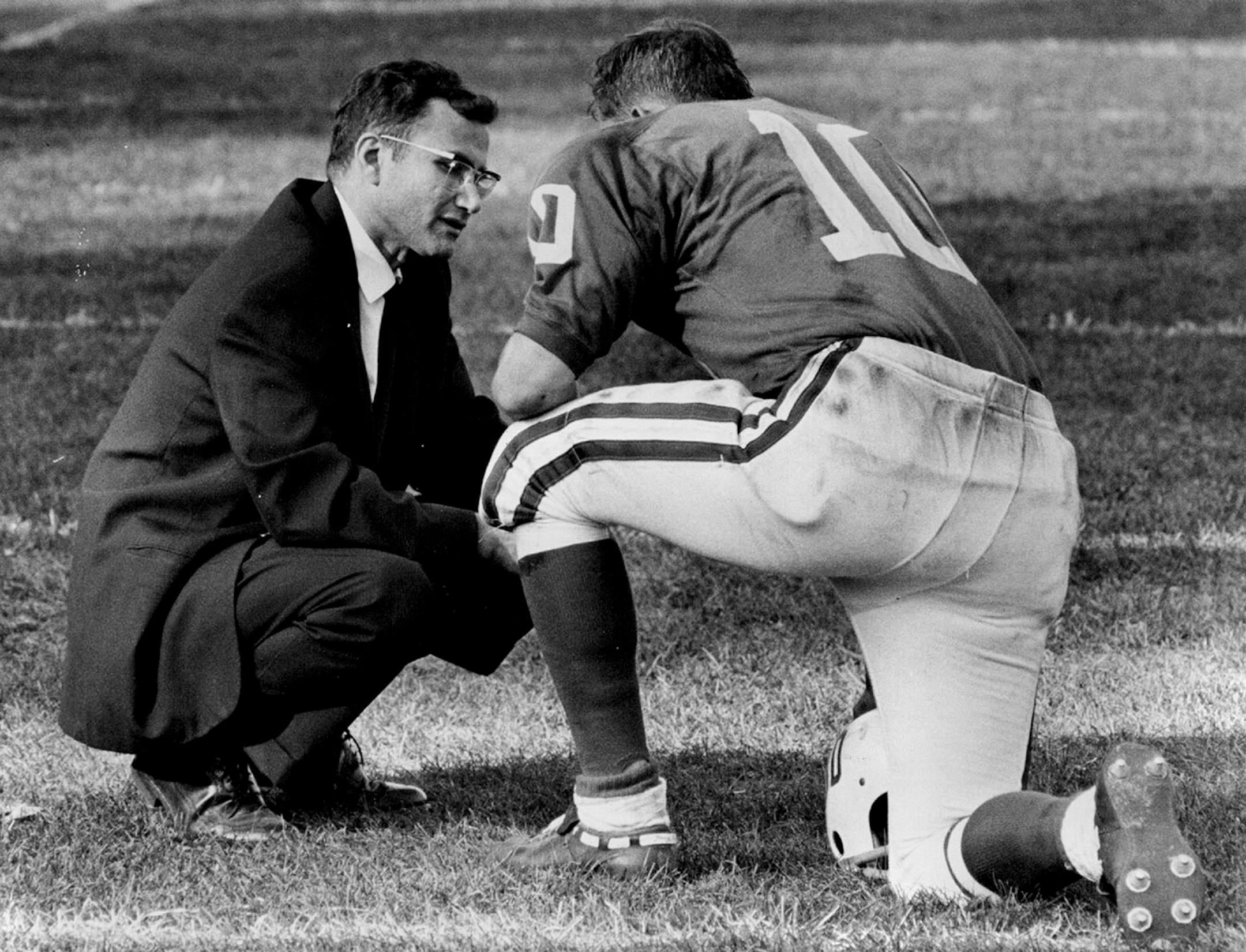 St. John's coach John Gagliardi went over some strategy with one of the Johnnies in October of 1963.