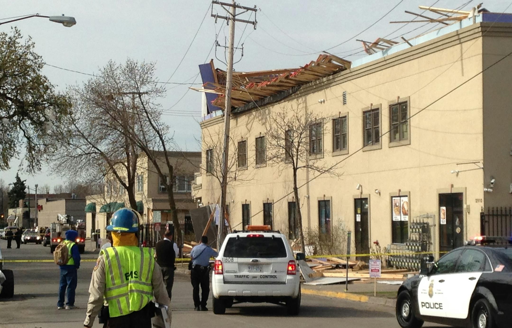 At least part of a retail building in south Minneapolis where construction workers were on the job has collapsed, according to police. Part of Karmel Square, at 2910 Pillsbury Avenue just north of W. Lake Street, gave way around 8:45 a.m. Photo: Bruce Bisping - Star Tribune 5/6/2014