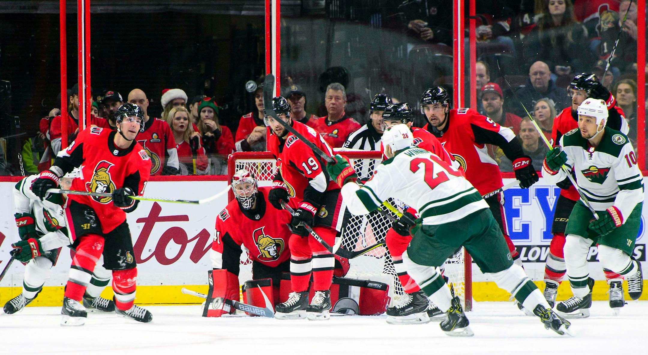 Minnesota Wild's Daniel Winnik attempts to stop a shot with his stick while taking on the Ottawa Senators during second period NHL hockey action in Ottawa on Tuesday, Dec. 19, 2017. (Sean Kilpatrick/The Canadian Press via AP)