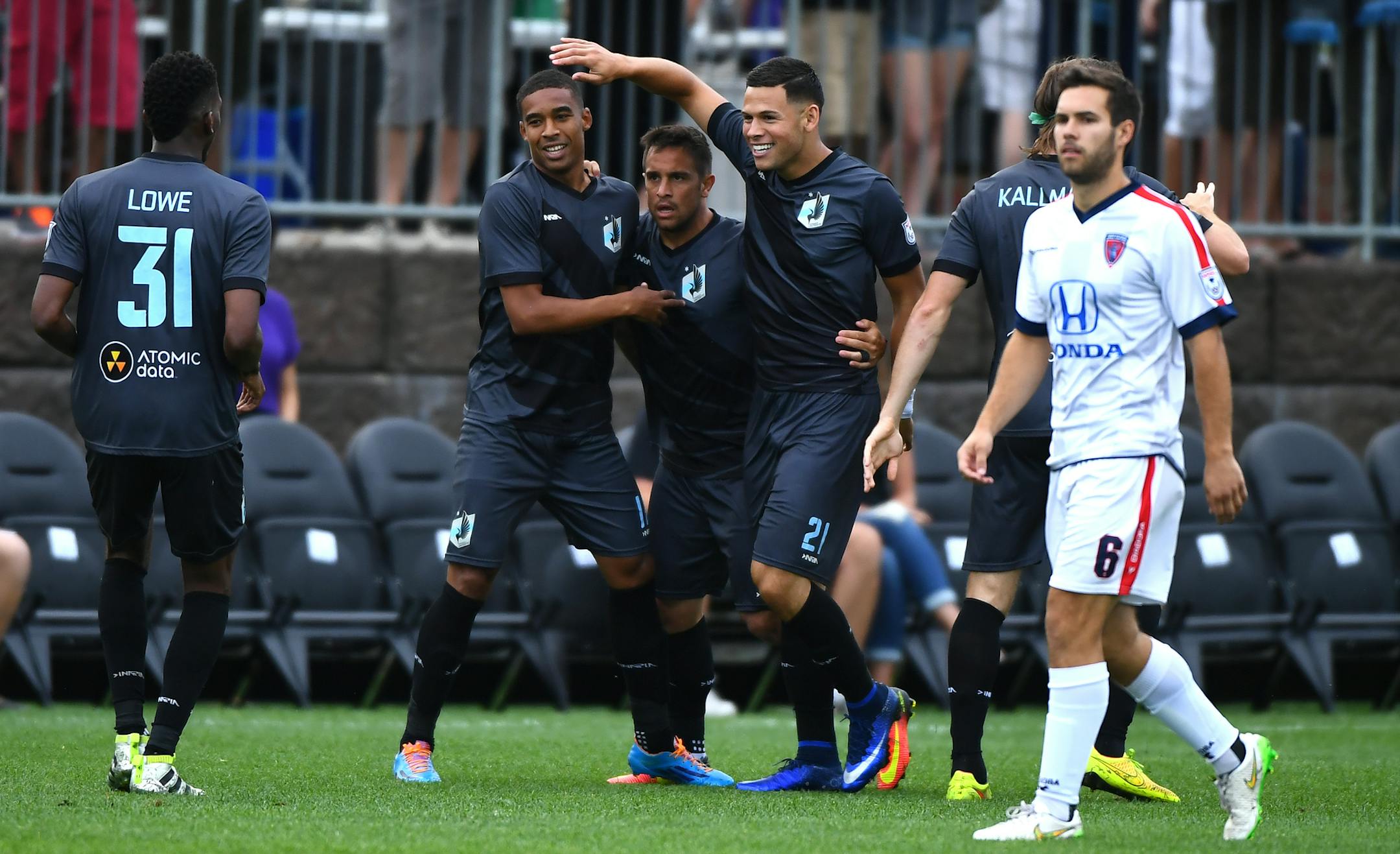Teammates celebrated with Minnesota United FC forward Christian Ramirez (21) after he scored his second goal against the Indy Eleven early in the first half Saturday. ] (AARON LAVINSKY/STAR TRIBUNE) aaron.lavinsky@startribune.com Minnesota United F.C. played the Indy Eleven on Saturday, July 16, 2016 at the National Sports Center in Blaine, Minn.