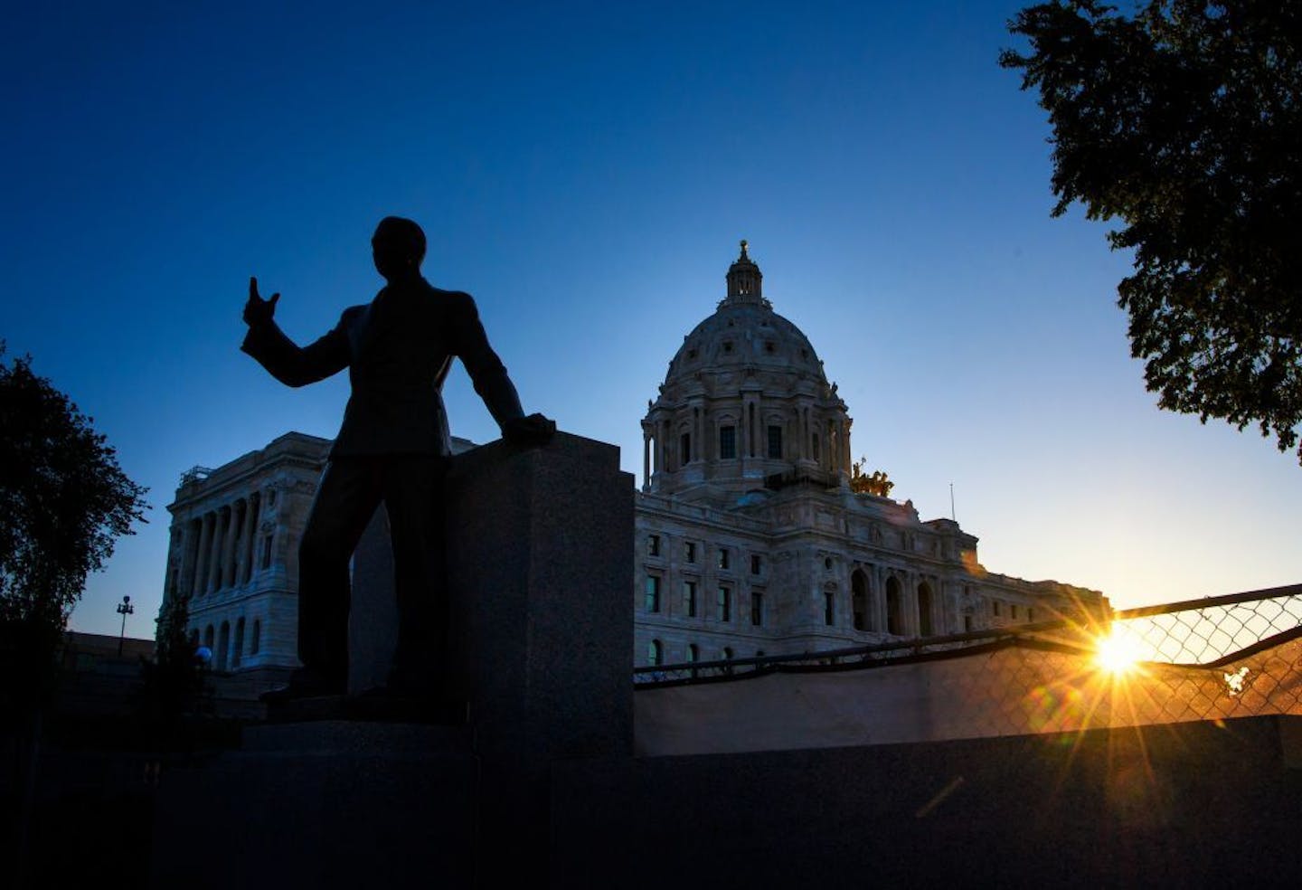 As the sun rose behind the Minnesota State Capitol, lawmakers continued their work inside in their all night special session that continues into Wednesday, May 24, 2017. Major bills are still unresolved.