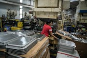 A stovetop griddle was stamped out of aluminum at Nordic Ware in St. Louis Park. The company aims to be PFAS-free by the end of March, ahead of Minnes