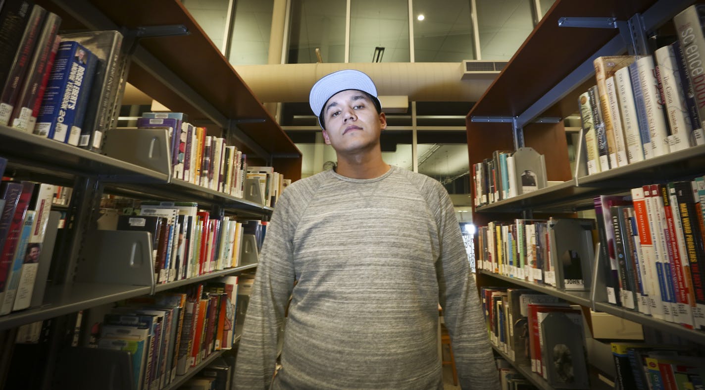 Tall Paul (aka Paul Wenell Jr) posed for a picture at the East Lake Community Library near where he lives on Thursday, January 23, 2013, in Minneapolis, Minn. ] (RENEE JONES SCHNEIDER reneejones@startribune.com)