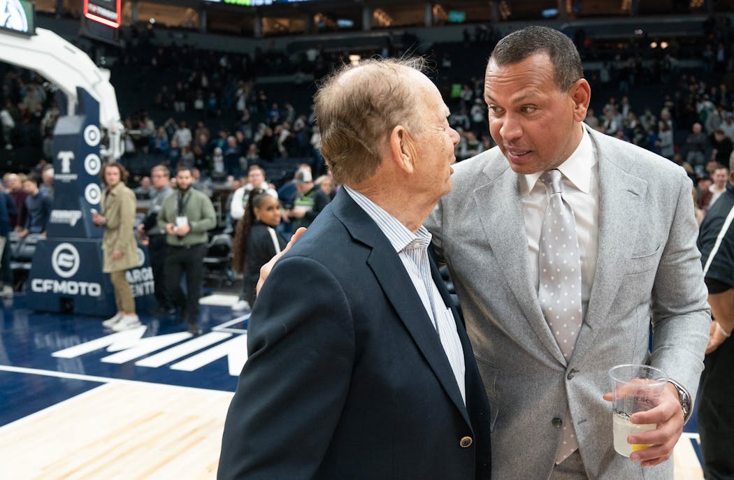 Minnesota Timberwolves majority owner Glen Taylor greets minority share owner Alex Rodriguez after the team’s win over the Cleveland Cavaliers Jan. 14, 2023 at Target Center in Minneapolis.