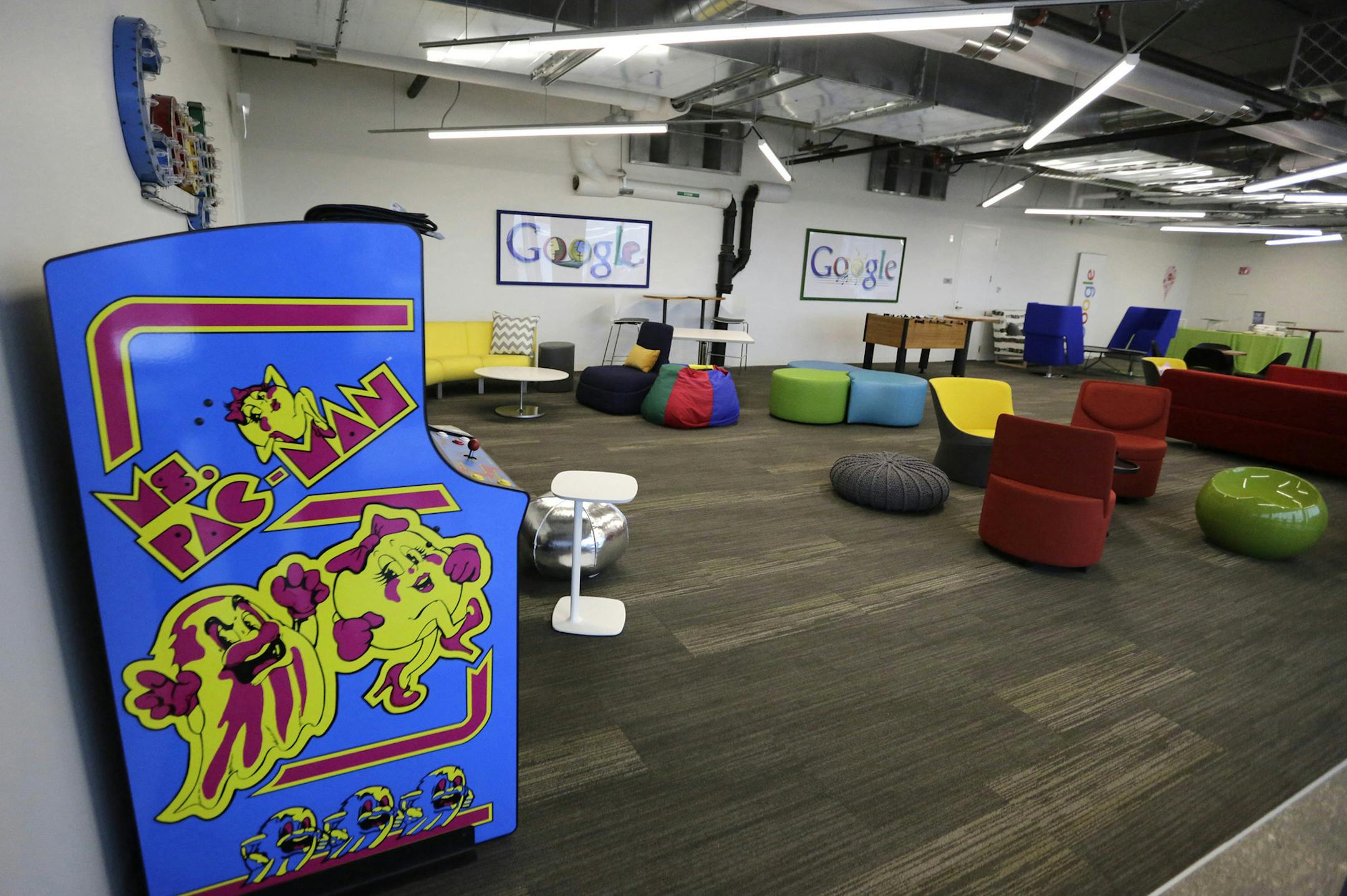 This photo shows a recreation space at the new Google Chicago headquarters Thursday, Dec. 3, 2015, in Chicago. The new offices occupy about 200,000 square feet and house a staff of around 650 full time employees. (AP Photo/M. Spencer Green) ORG XMIT: ILMG107