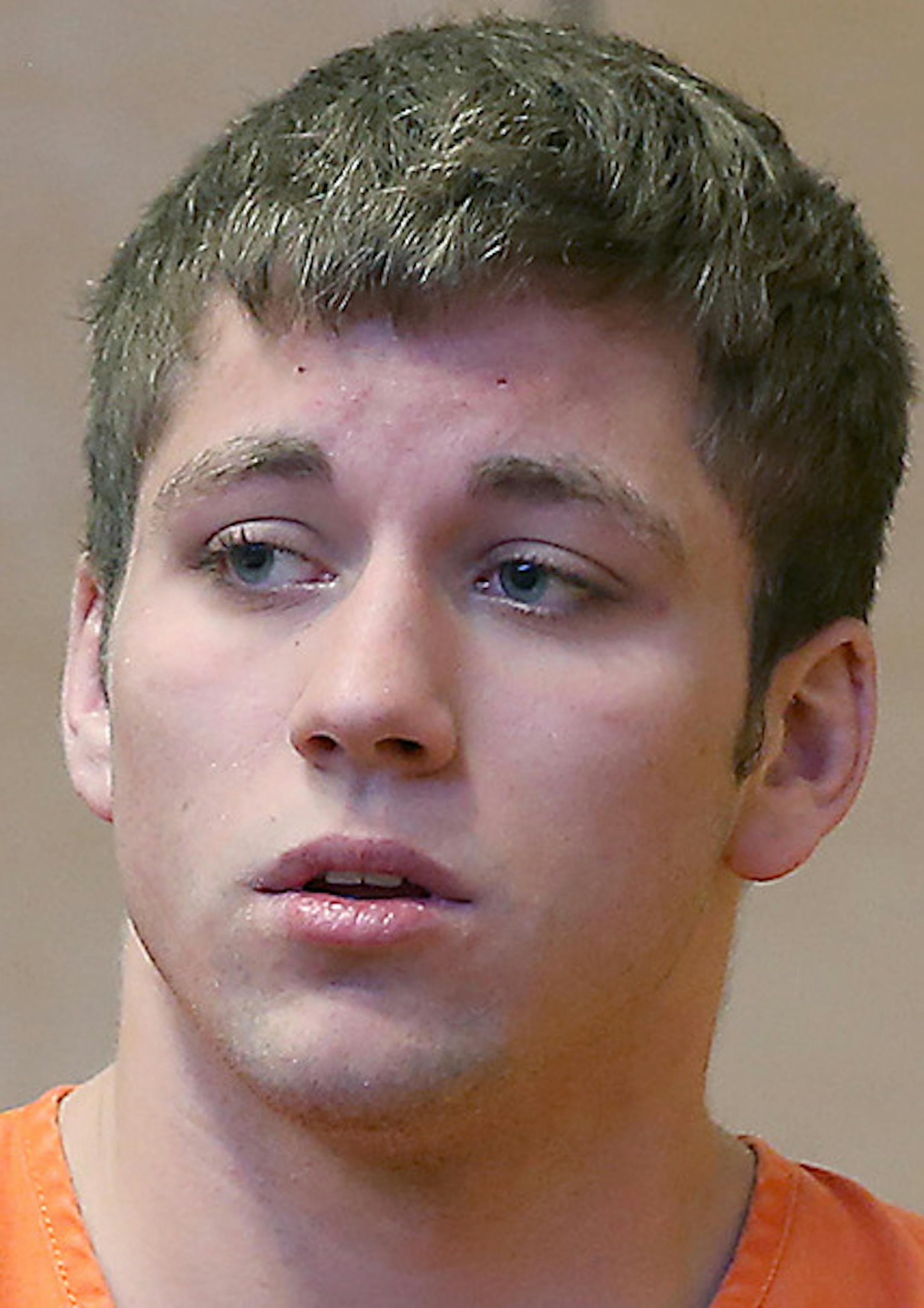 Nineteen-year-old Levi Acre-Kendall made his way into the Polk County Justice Center, Wednesday, April 22, 2015 in Balsam Lake, WI. Acre-Kendall is charged with fatally stabbing Peter Kelly in the heart after the men's two groups of friends engaged in a three-hour long dispute while fishing. ] (ELIZABETH FLORES/STAR TRIBUNE) ELIZABETH FLORES • eflores@startribune.com