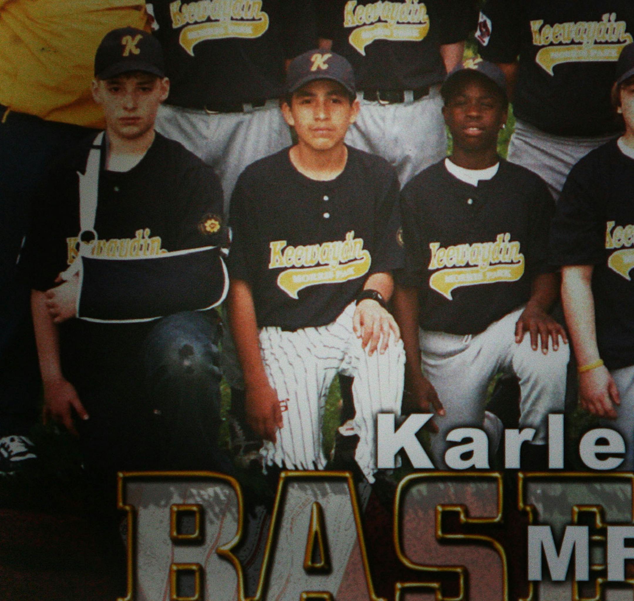 Minneapolis police have identified the victim of an alleged drive-by shooting as 14-year-old Augustin Andrade Navarro, center.