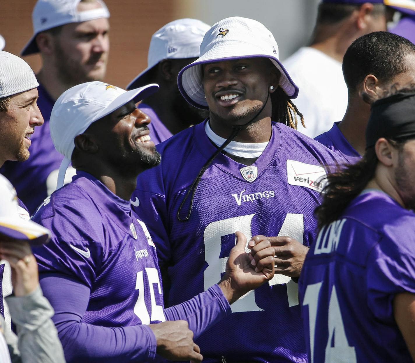 Minnesota Vikings receivers Greg Jennings (15) and Cordarrelle Patterson (84) appear happy to be back at training camp Friday, July 25, 2014, at Mankato State University in Mankato, MN.] (DAVID JOLES/STARTRIBUNE) djoles@startribune Minnesota Vikings training camp Friday, July 24, 2014, in Mankato, MN.