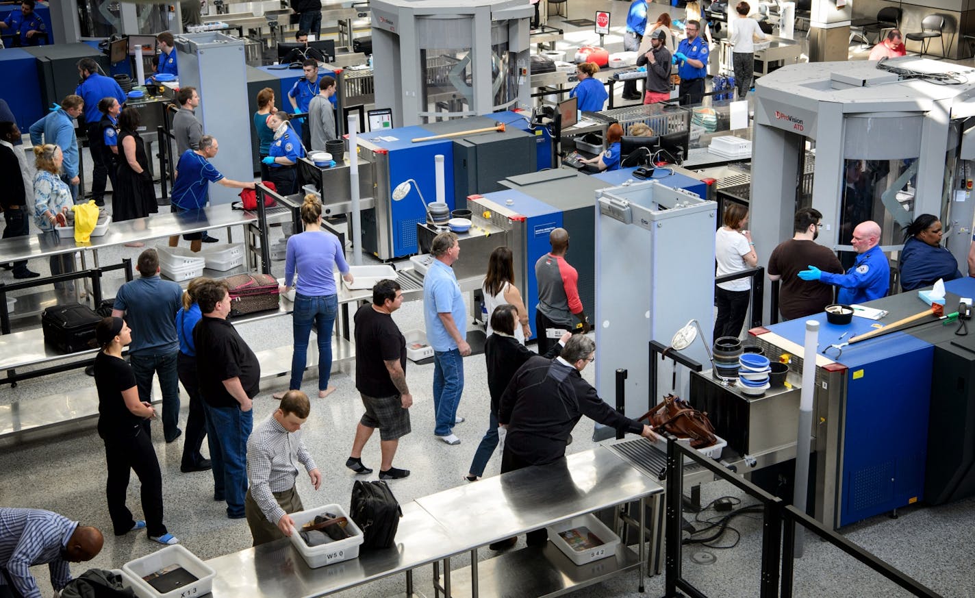 Delta Air Lines will hire staff to help speed up security lines at Minneapolis-St. Paul International Airport.