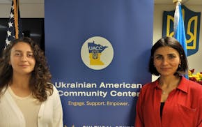 Tetiana Chukhniai, left, and Iryna Petrus, right, pose for a photo on May 8.