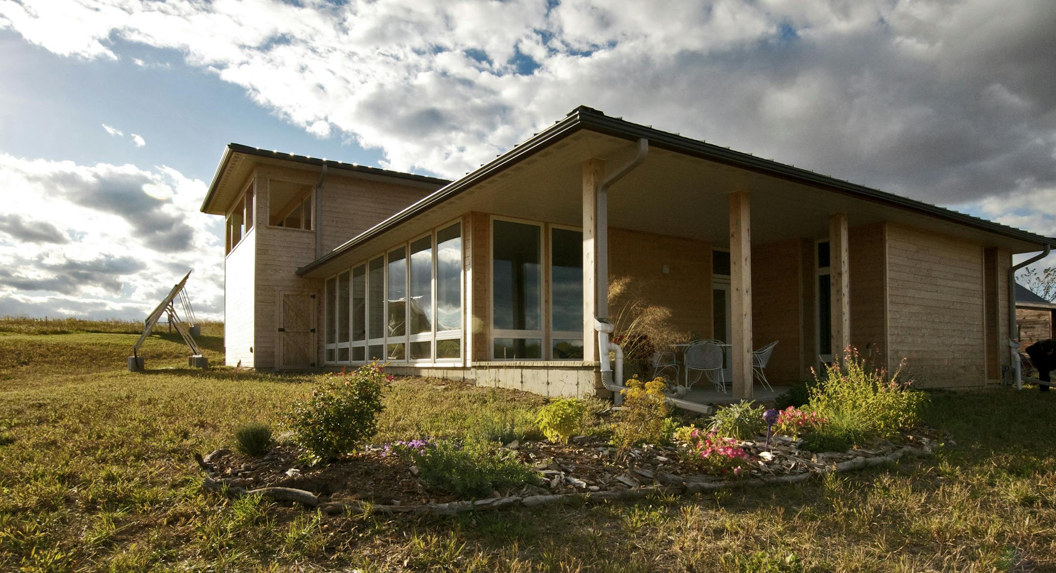 Super-green home in Winona makes as much energy as it uses, designed by Locus Architecture.