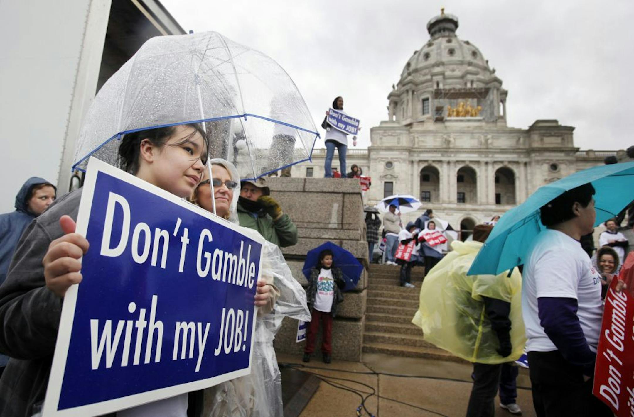 Hope Segonee, 12, and her mom, Blake Olson, of Apple Valley attended a rally held by tribal interests opposed to expanded gambling. Olson works at Mystic Lake Casino.