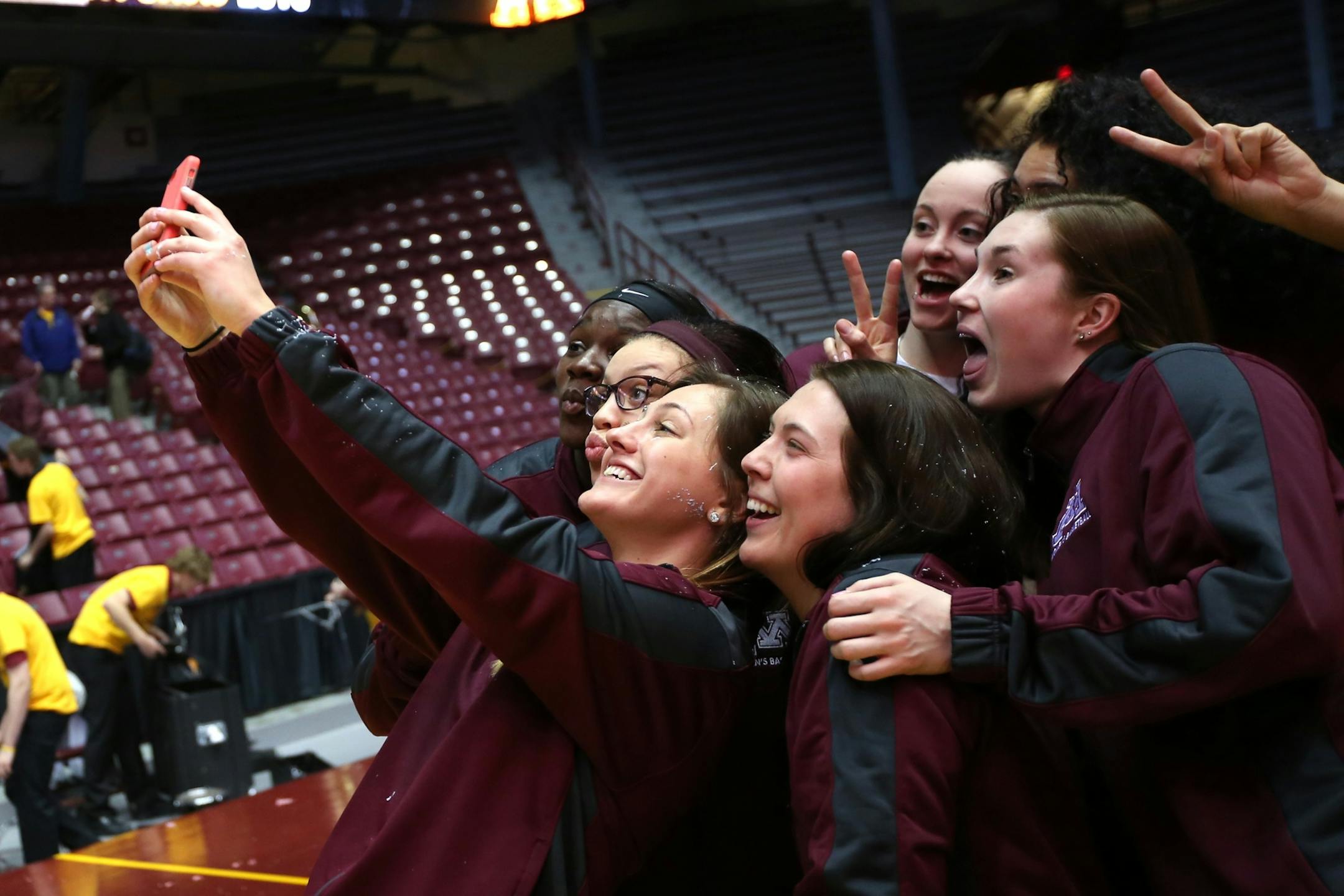 Gopher women's basketball players celebrated with a group selfie their announcement as an 8 seed in the in the NCAA women's tournament on Monday, March 6, 2015 at a public viewing party at WIlliams Arena at the University of Minnesota in Minneapolis, Minn. ] RENEE JONES SCHNEIDER ï reneejones@startribune.com