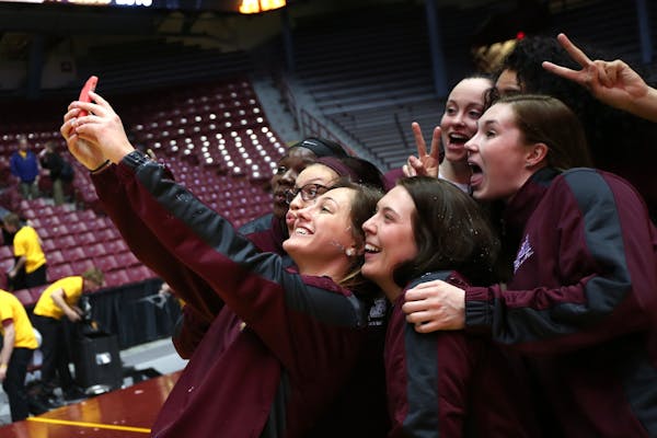 Gopher women's basketball players celebrated with a group selfie their announcement as an 8 seed in the in the NCAA women's tournament on Monday, Marc