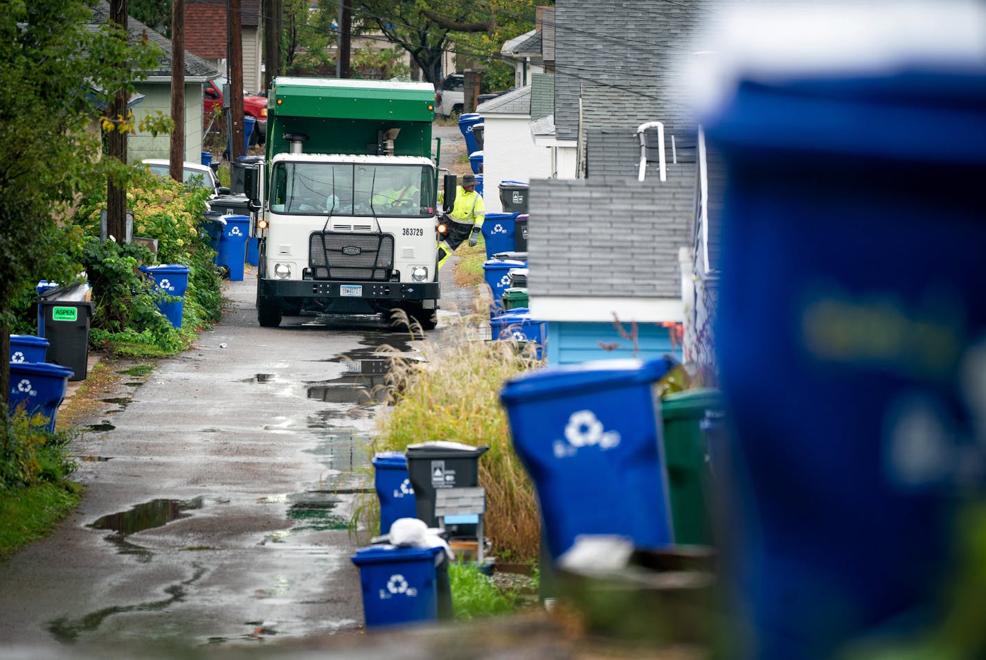 Waste Management worker Daniel Westerhaus collected trash from the alleys of the Snelling Hamline neighborhood of St Paul's yellow zone on the first day of organized trash collection. ] GLEN STUBBE &#x2022; glen.stubbe@startribune.com Monday, October 1, 2018 St. Paul has begun its organized trash collection, a dramatic shift in how the city collects its waste. Scattered reports of residents using the wrong bins, but so far no major snafus.
What's Happening at this time: Organized trash collectio