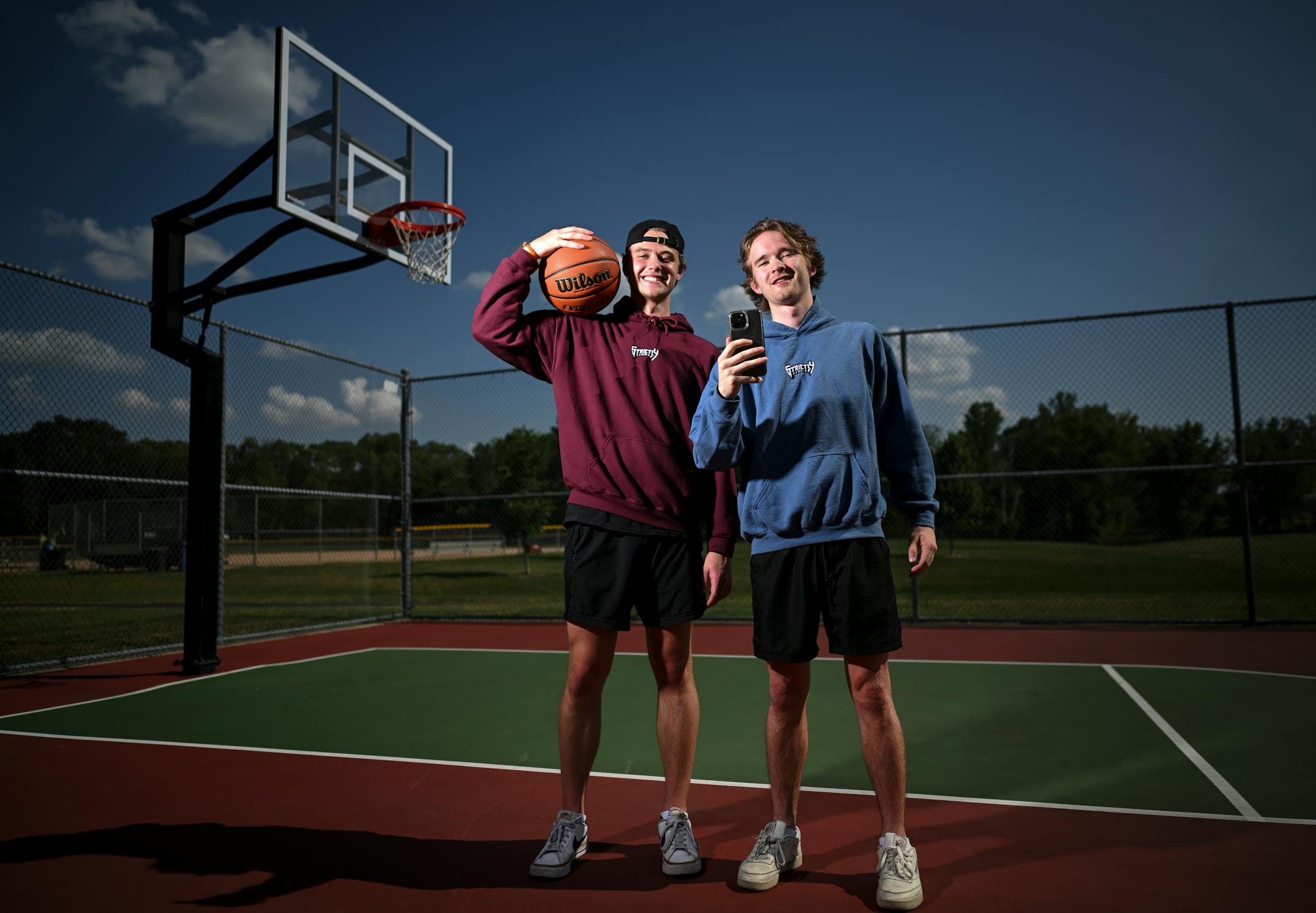 Joe Doerrer, right, and Nolan Newberg, who run Strictly Bball together, stand for a portrait at Shamrock Park Monday, June 20, 2022 in Shoreview, Minn.. ] Aaron Lavinsky • aaron.lavinsky@startribune.com