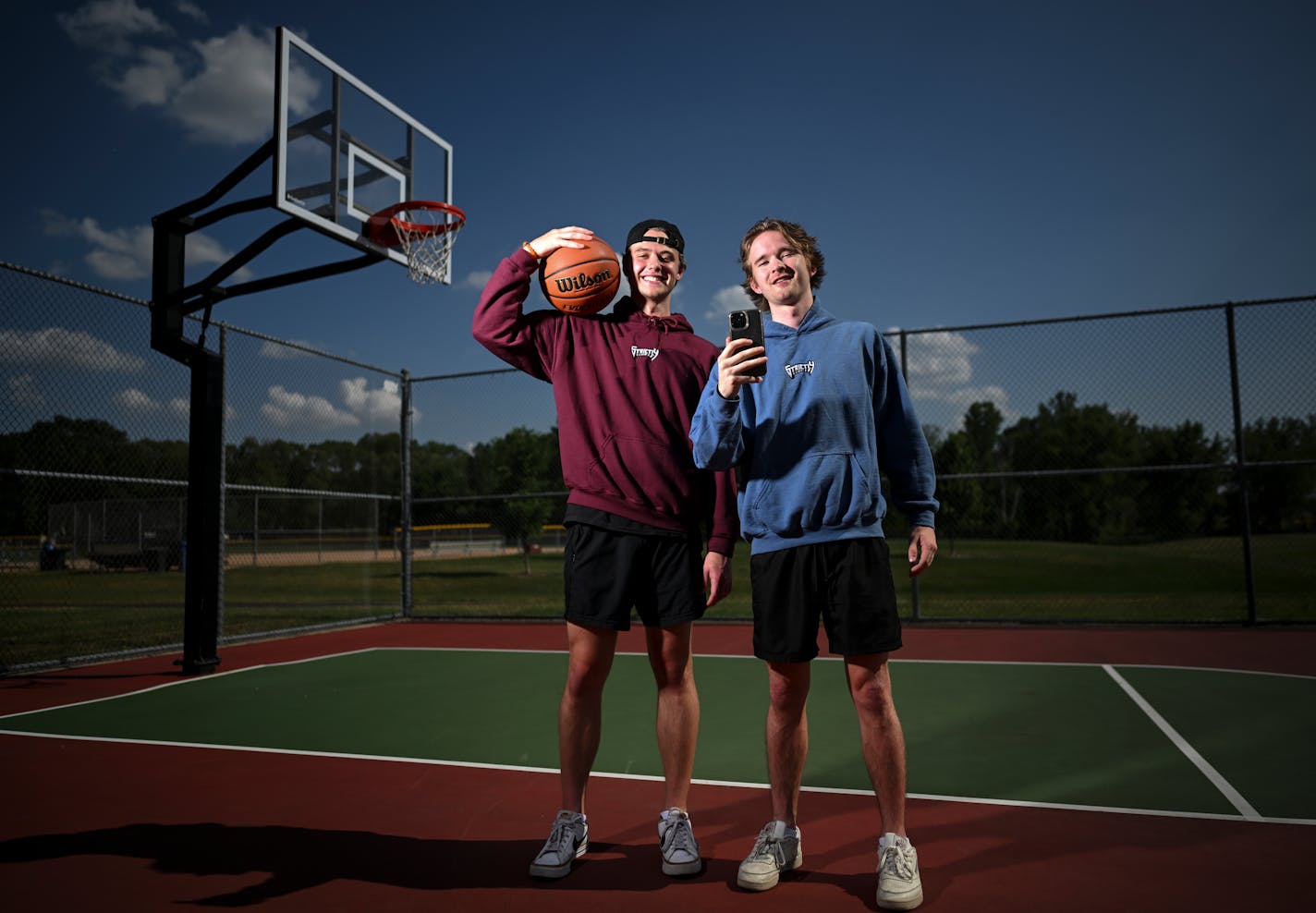 Joe Doerrer, right, and Nolan Newberg, who run Strictly Bball together, stand for a portrait at Shamrock Park Monday, June 20, 2022 in Shoreview, Minn.. ] Aaron Lavinsky • aaron.lavinsky@startribune.com