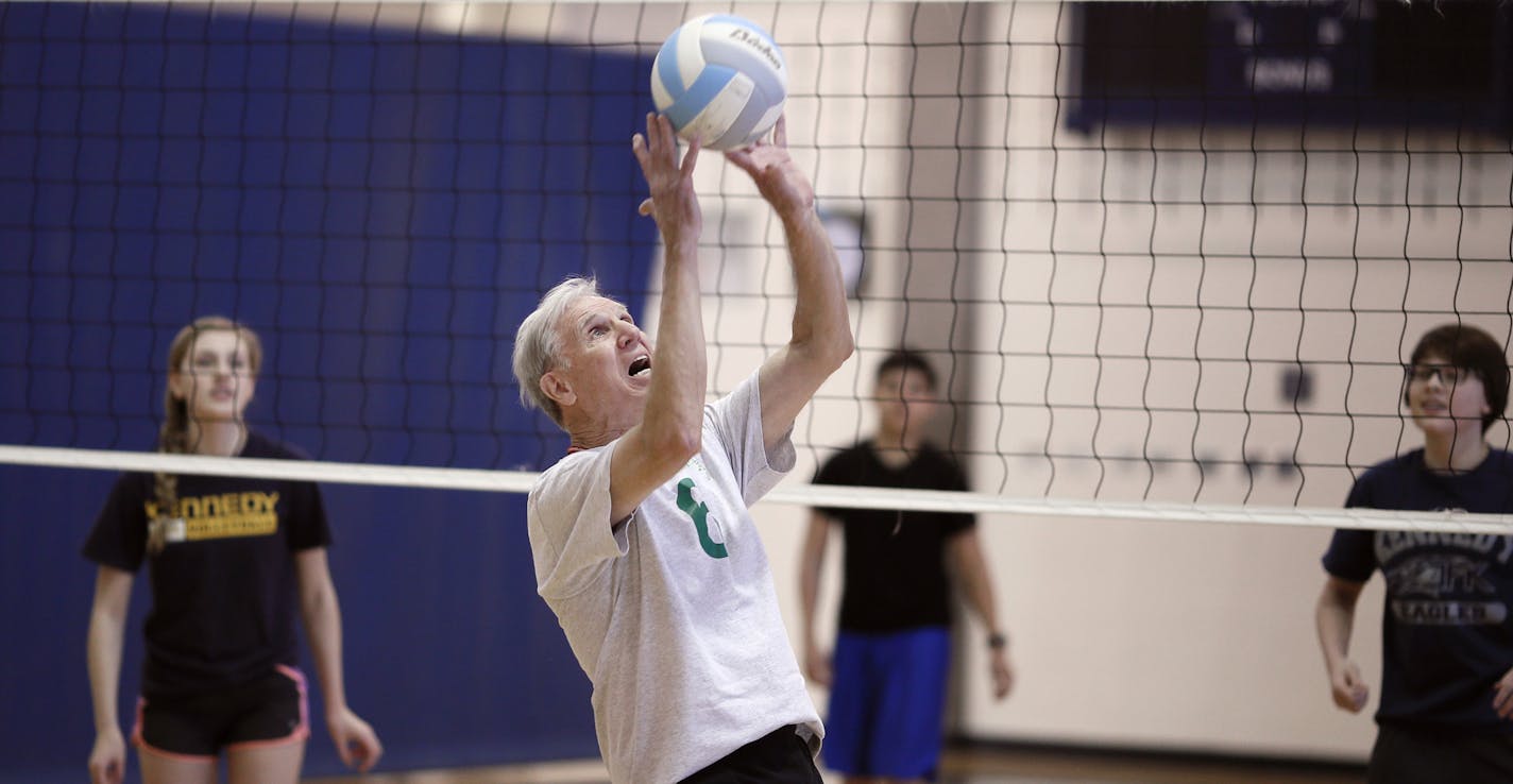 Bob Wandberg tried to hit the ball over the net during a volley ball game with Jefferson High students . A group of senior citizens who call themselves "Born Again Jocks" played volleyball with sophomore students at Kennedy High school Monday March 2, 2015 in Bloomington, Minnesota. The team includes seniors who have been selected to play in the upcoming Senior Olympics this summer.] Jerry Holt/ Jerry.Holt@Startribune.com