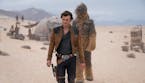 Alden Ehrenreich and Joonas Suotamo in a scene from "Solo: A Star Wars Story."
