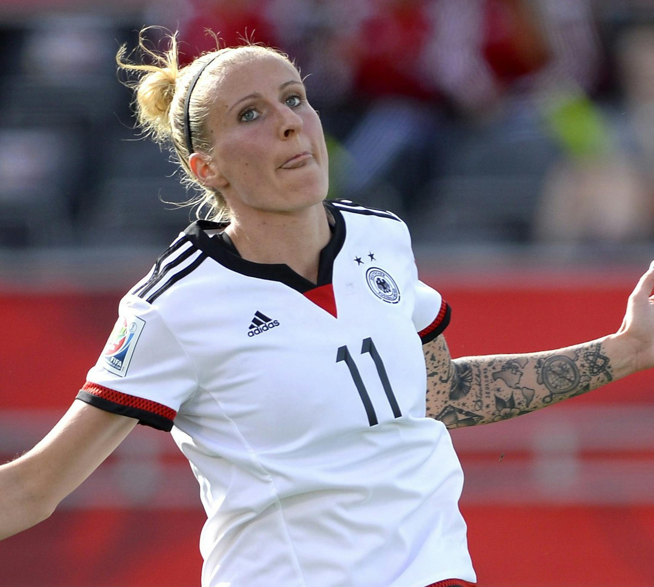 Germany's Anja Mittag (11) celebrates her goal during second half FIFA Women's World Cup soccer action in Ottawa, Ontario, Sunday, June 7, 2015. (Justin Tang/The Canadian Press via AP) MANDATORY CREDIT