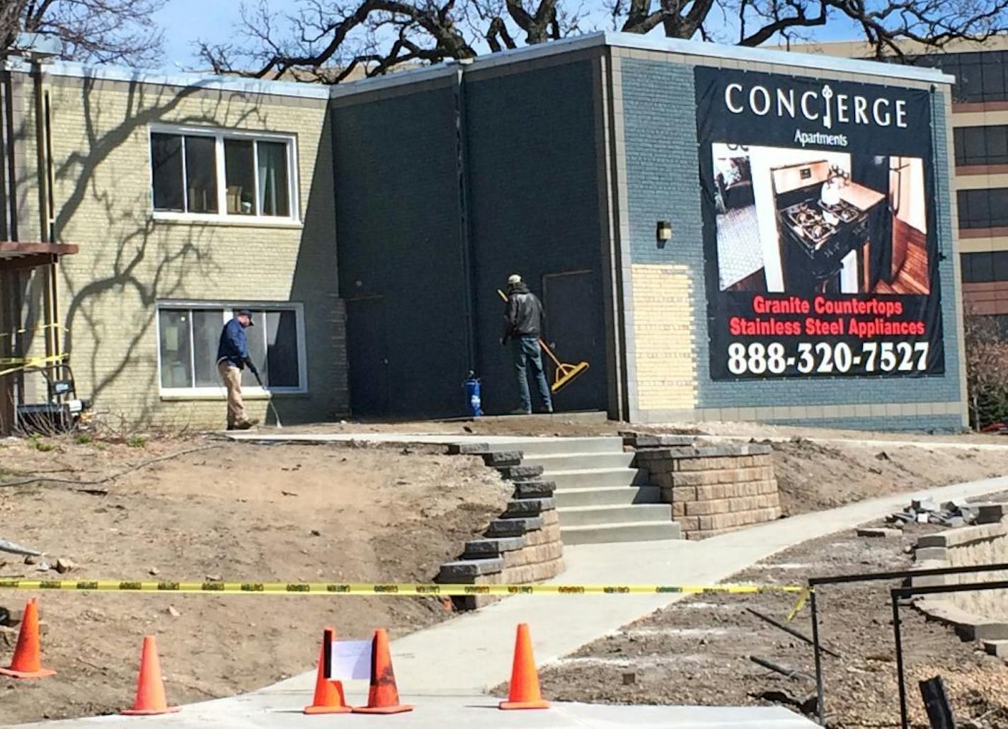 Masonry work is underway at the Concierge Apartments in Richfield. Out-of-state investors are snapping up older apartment complexes like this one in the first- and second-ring suburbs of the Twin Cities, renovating them and moving them upmarket.