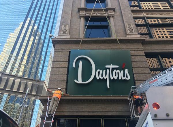 Workers hung new signs on the the Dayton's Project on Thursday, Aug. 29, 2019 in Minneapolis.