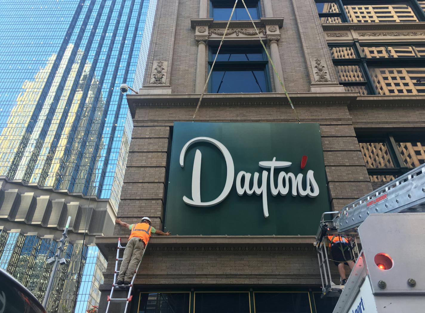 Workers hung new signs on the the Dayton's Project on Thursday, Aug. 29, 2019 in Minneapolis.