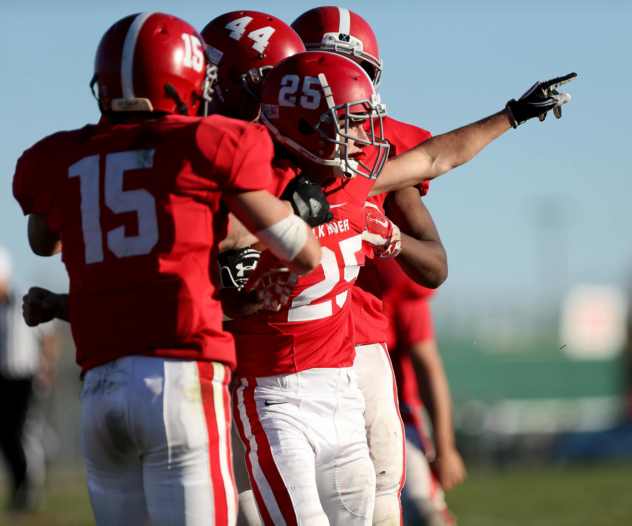 Jake Buhl of Elk River celebrates an interception against Rogers during their playoff game at Elk River High School. ] LEILA NAVIDI leila.navidi@startribune.com / BACKGROUND INFORMATION: Elk River and Rogers High School faced off in a playoff game at Elk River High School in Elk River, Minn. on Saturday, October 25, 2014.