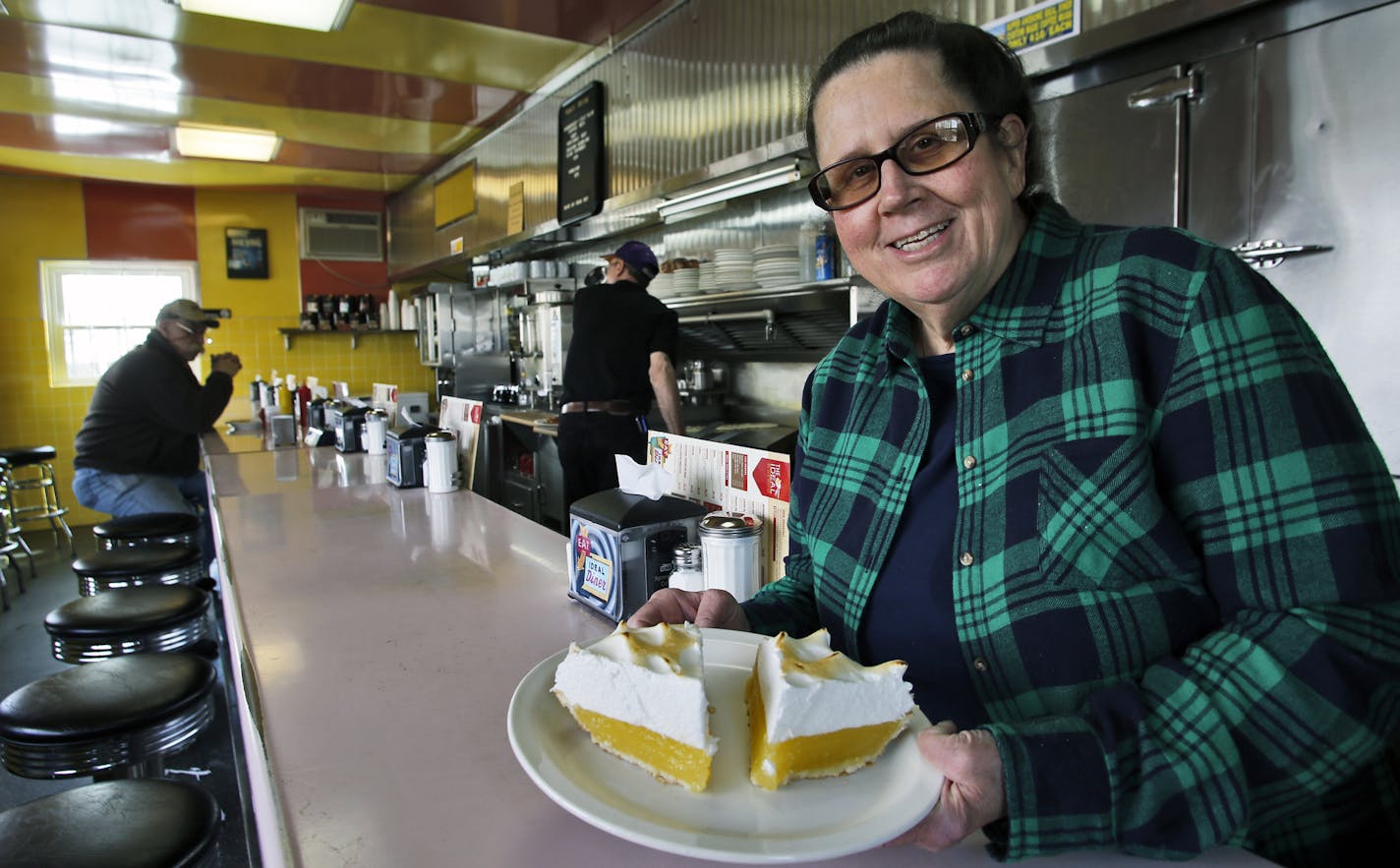 Ideal Diner owner Kim Robinson with a platter of lemon merange pie. ] Diners and Cafes along Central Ave. in NE Minneapolis. (MARLIN LEVISON/STARTRIBUNE(mlevison@startribune.com)