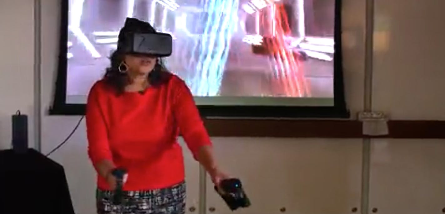 Star Tribune video reporter Vineeta Sawker uses the SapientNitro, demonstating what an intense experience virtual reality can be. Photo: screen grab from Star Tribune video by Matt Gillmer. 10/30/15