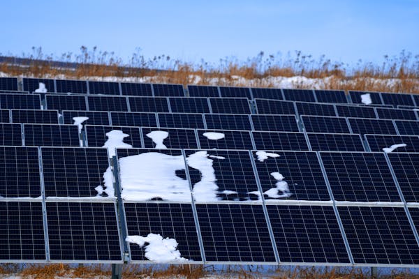 Bits of snow covered panels at a solar garden Winona subscribes to on Burns Valley Road in La Crescent.