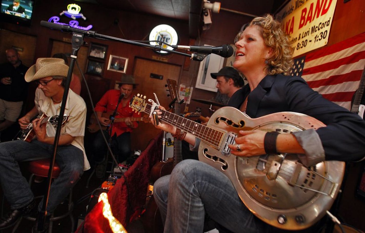 Molly Maher with Her Disbelievers band performing at Nye's in Minneapolis.