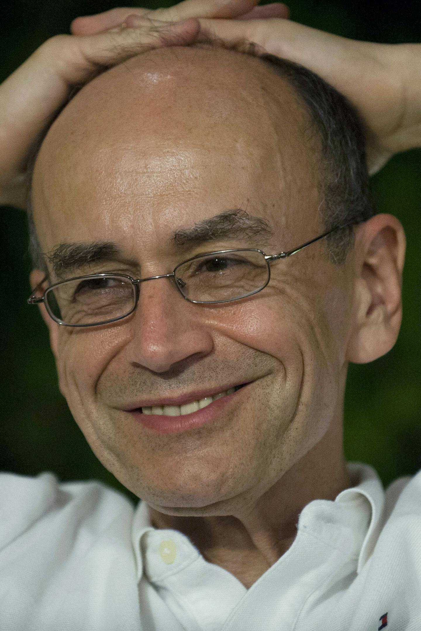 Stanford University professor Thomas Sudhof smiles in his hotel during an interview with a journalist in Baeza, Spain, Monday Oct. 7, 2013. German-born researcher Sudhof and Americans James Rothman and Randy Schekman have won the 2013 Nobel Prize in medicine it was announced on Monday Oct. 7, 2013, as the Nobel committee cited their discoveries of unlocking the mysteries of the body's cell internal transport system, which relies on bubble-like structures called vesicles to deliver substances the