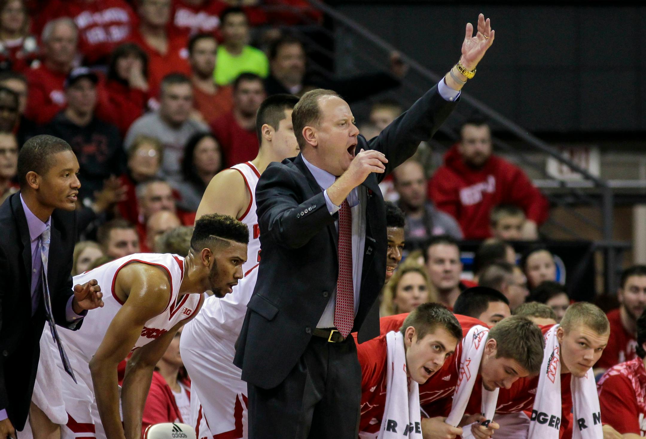 Wisconsin interim head coach Greg Gard yells to his team during the first half of an NCAA college basketball game against Green Bay Wednesday, Dec. 23, 2015, in Madison, Wis. (AP Photo/Andy Manis)