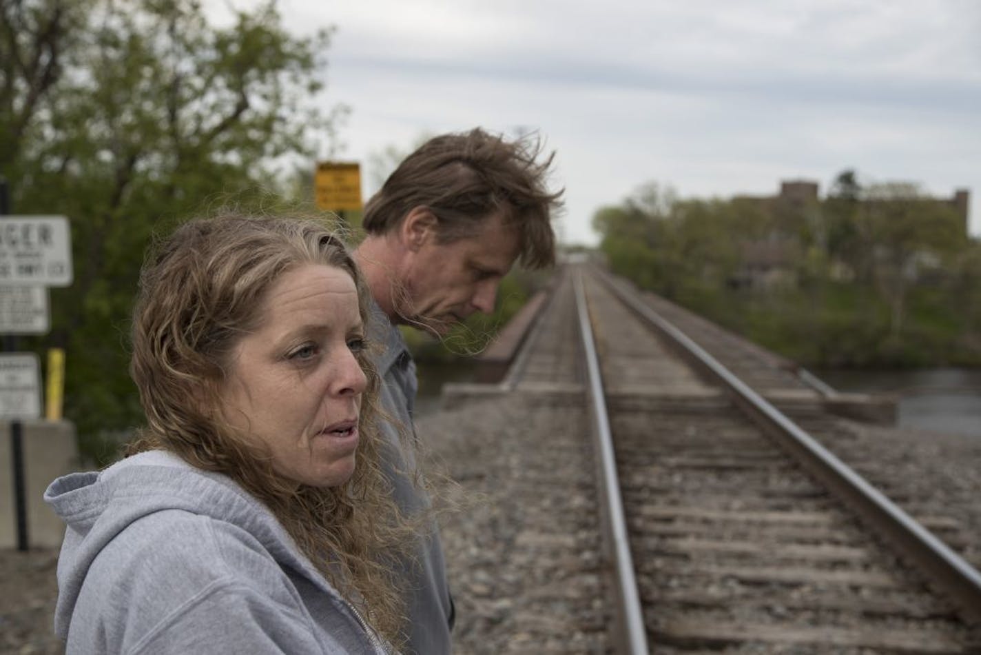 Dave Dady and his wife Kelly Dady ( Jesse�s stepmother ) stood on the railroad tracks near the bridge where his son 21-year old son Jesse Dady died Tuesday May 9, 2017 in St. Cloud, MN.