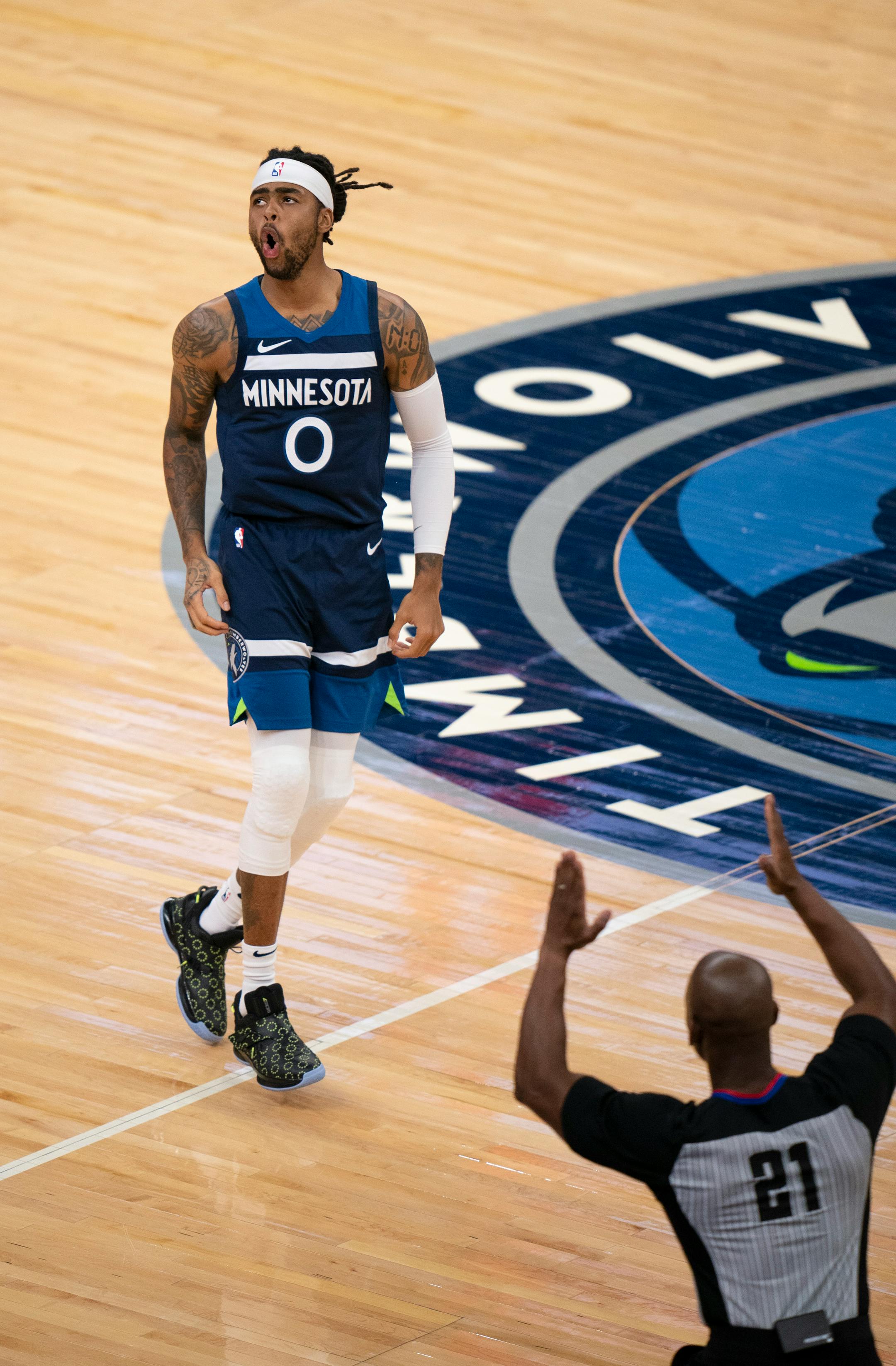 Minnesota Timberwolves guard D'Angelo Russell (0) reacted after hitting a second consecutive 3-point shot in the fourth quarter. He led the Wolves with 25 points.