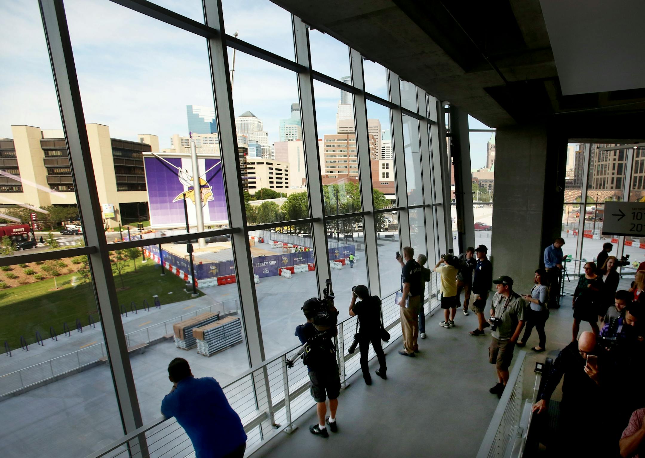 Media members take in the exterior view during a media tour Tuesday, July 19, 2016, at U.S. Bank Stadium in Minneapolis, MN.