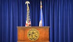 The Governor's podium with Minnesota State flag and state seal, state motto L'Étoile du Nord. ] GLEN STUBBE * gstubbe@startribune.com Tuesday, June 7