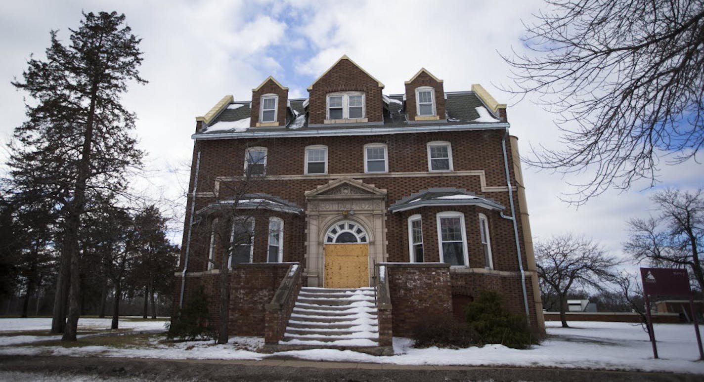 One of three boarded-up cottages at the former Anoka State Hospital in the city of Anoka that the nonprofit CommonBond Communities would like to renovate into apartments for veterans. Anoka County owns the campus along the Rum River.