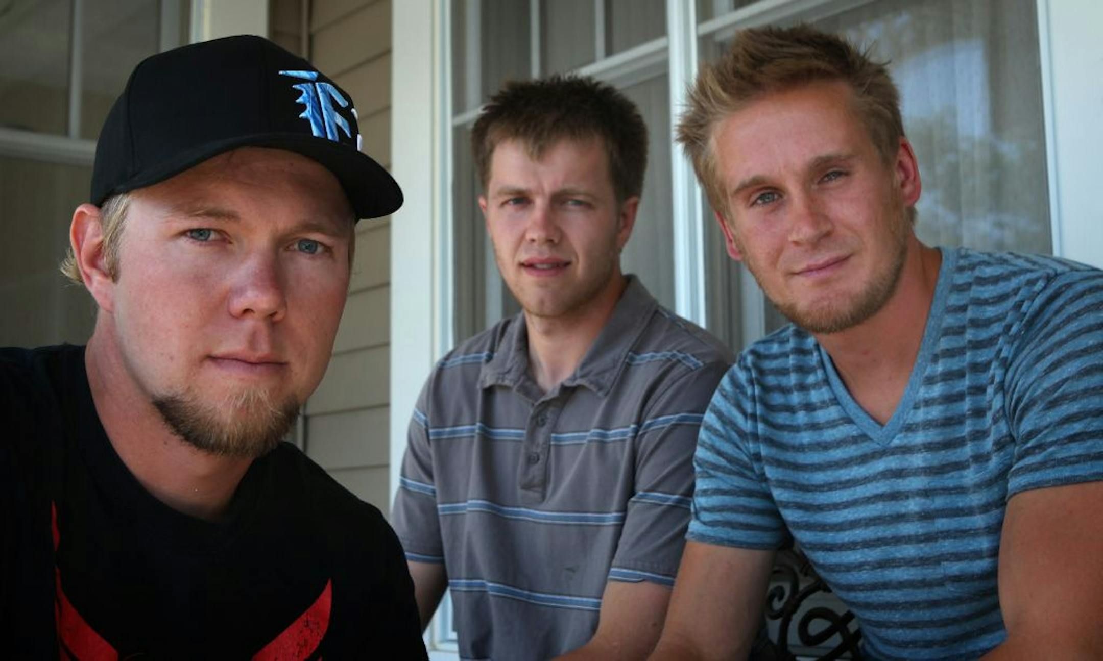 Jacob Kauppila (left), 27, Salt Lake City, Utah, Jared Bekkala (middle), Dassel, MN. and Chase Riutta, Missoula, Montana, traveled to the Twin Cities to attend a wedding and ended up stopping Thursday night on a freeway in Minnetonka to rescue a man who was trapped inside a burning vehicle. The three were photographed Friday afternoon, July8, outside their motel in Plymouth, MN.