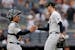 New York Yankees pitcher Clay Holmes (35) celebrates with Jose Trevino after the Yankees defeated the Chicago White Sox 7-2 in a baseball game Sunday,