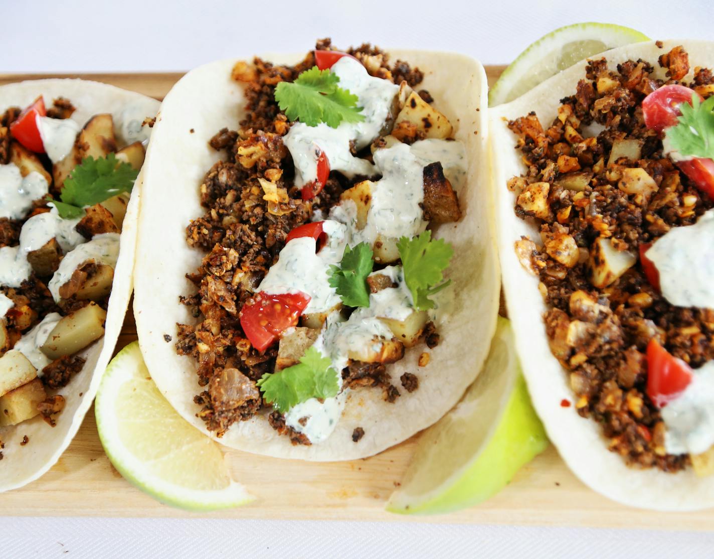 Mushroom-Walnut Tacos with Cilantro Cream.