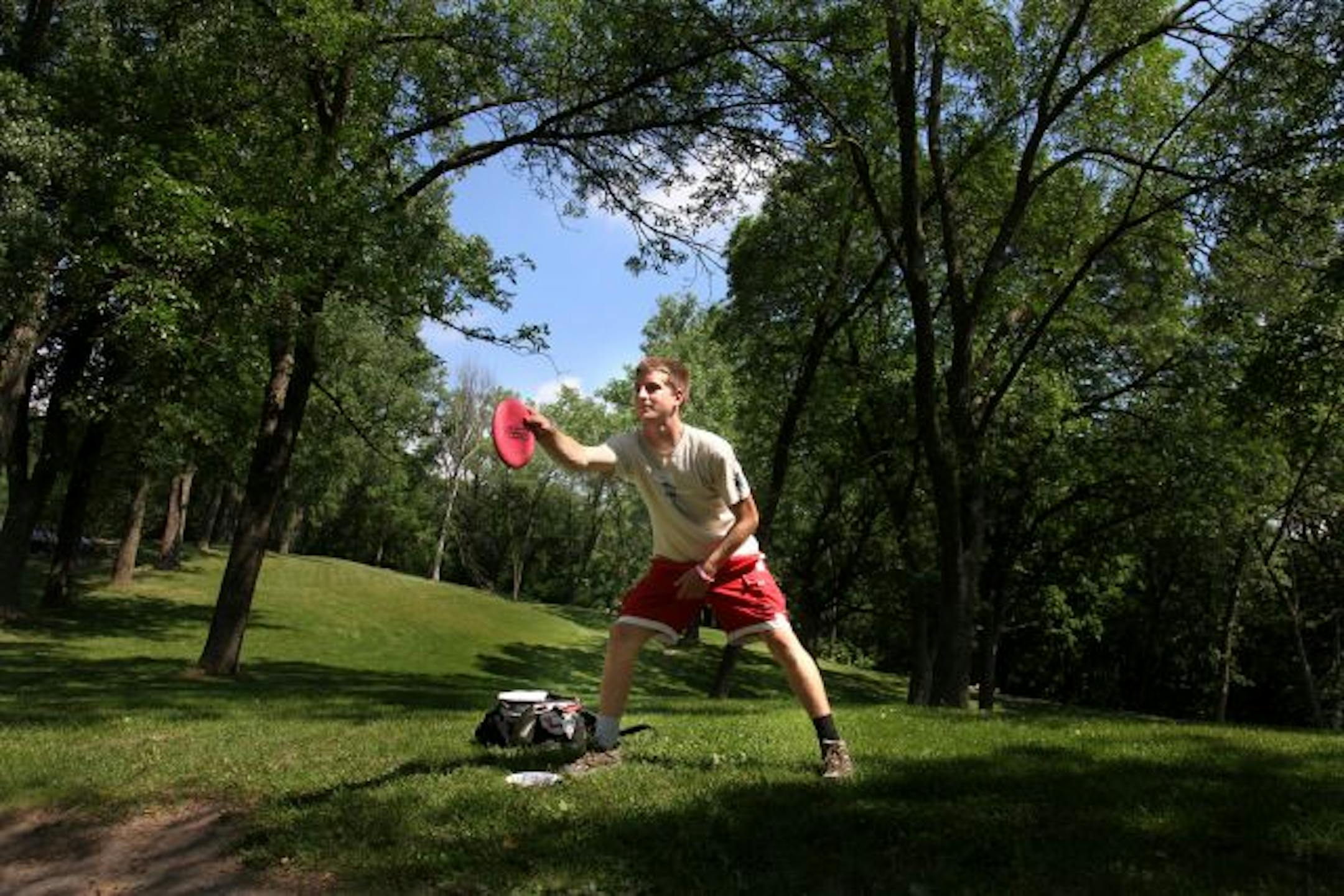 Joey Kozlowski of Laramie, Wyoming, took to the Kaposia Disc Golf course for practice. Kozlowski is in Minnesota for the Minnesota Majestic Disc Golf Tournament.