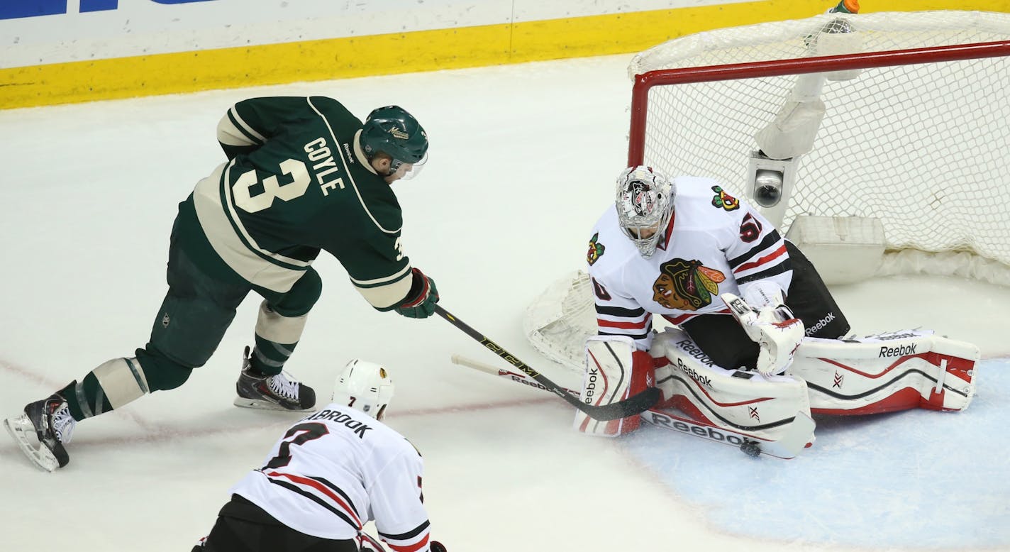 Wild center Charlie Coyle got his shot blocked by Blackhawks goalie Corey Crawford during the third period of Game 6 on Tuesday night at Xcel Energy Center.