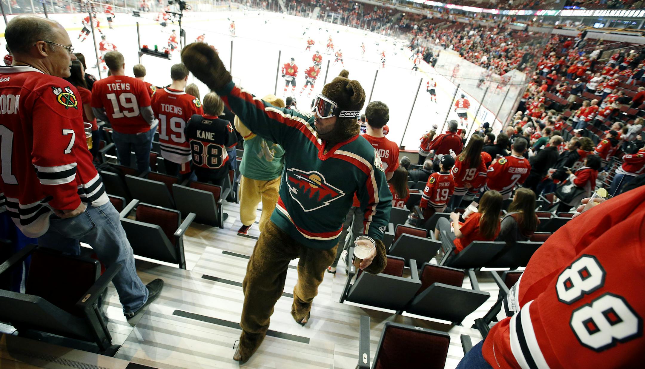 Minnesota Wild fan Ro Shirole of Wayzata walked through the stands of the United Center before game 1 between the Minnesota Wild and Chicago Blackhawks at the United Center. ] CARLOS GONZALEZ cgonzalez@startribune.com - May 2, 2014, Chicago, Illinois, United Center, NHL, Minnesota Wild vs. Chicago Blackhawks, Stanley Cup Playoffs Round 2, Game 1