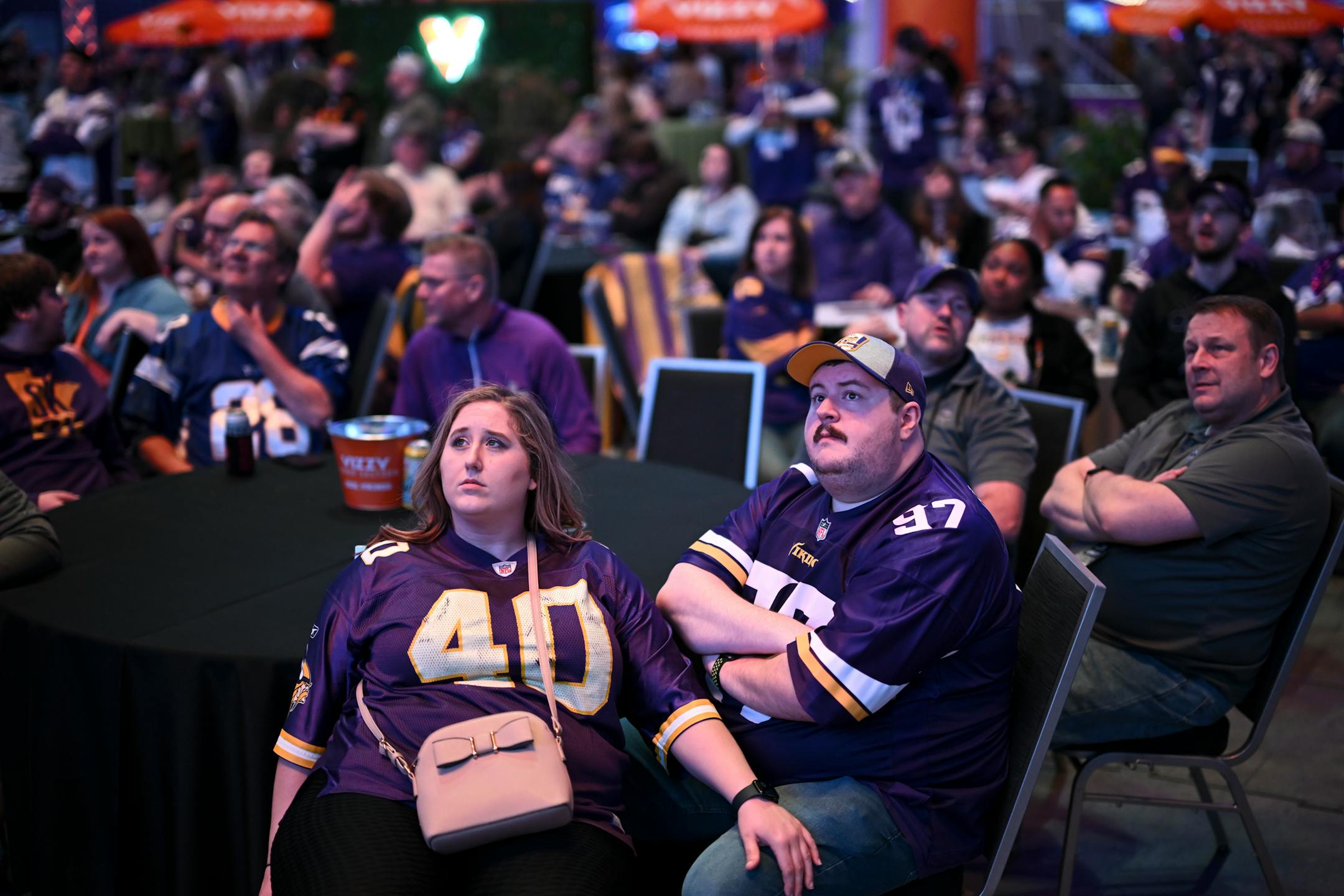 Brittany Nystrom and Matthew Feinberg eagerly await the Vikings' first round draft pick during the Vikings NFL Draft Party.