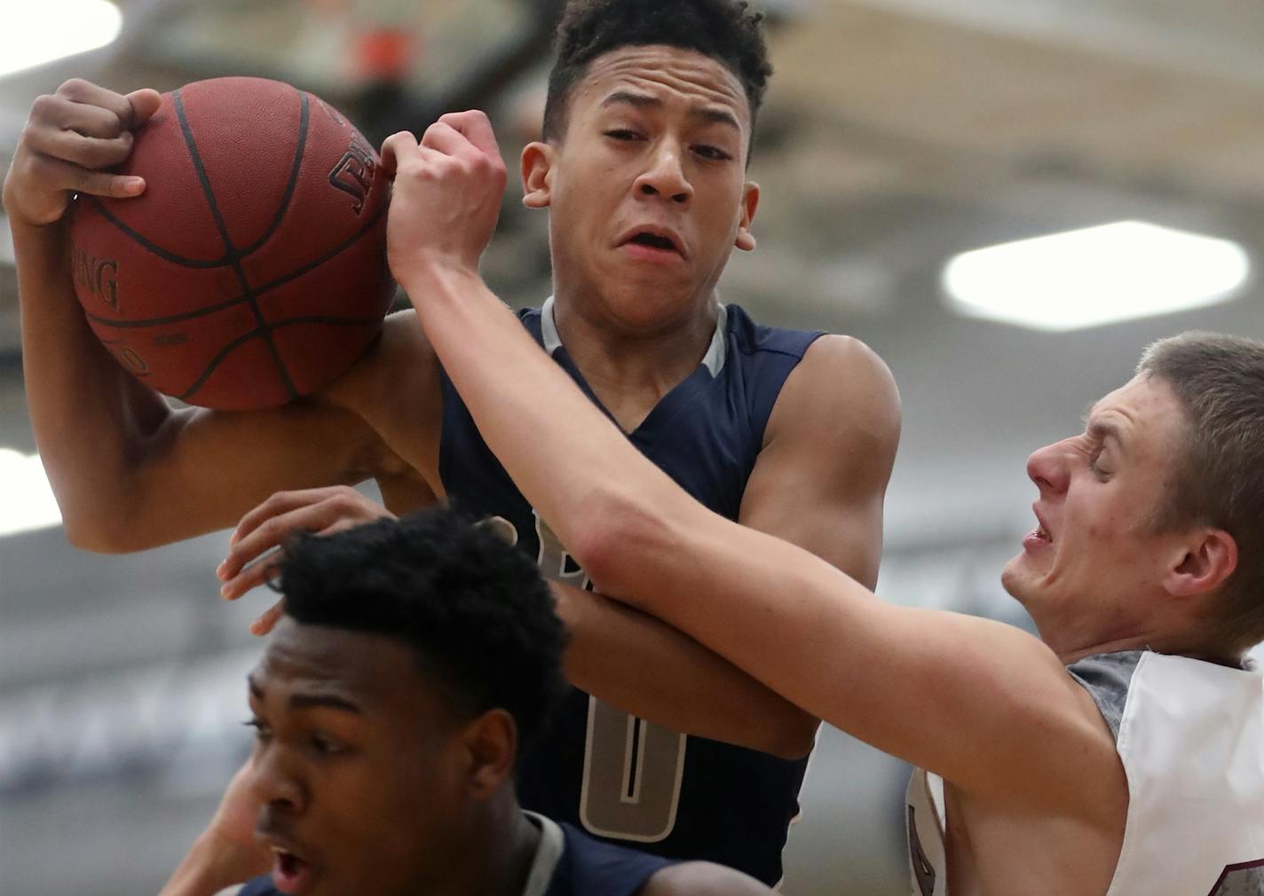 Brain Smith(0), far left jumped high to grab a rebound.Champlin crushed Anoka in a home game.] RICHARD TSONG-TAATARII &#x2022; richard.tsong-taatarii@startribune.com