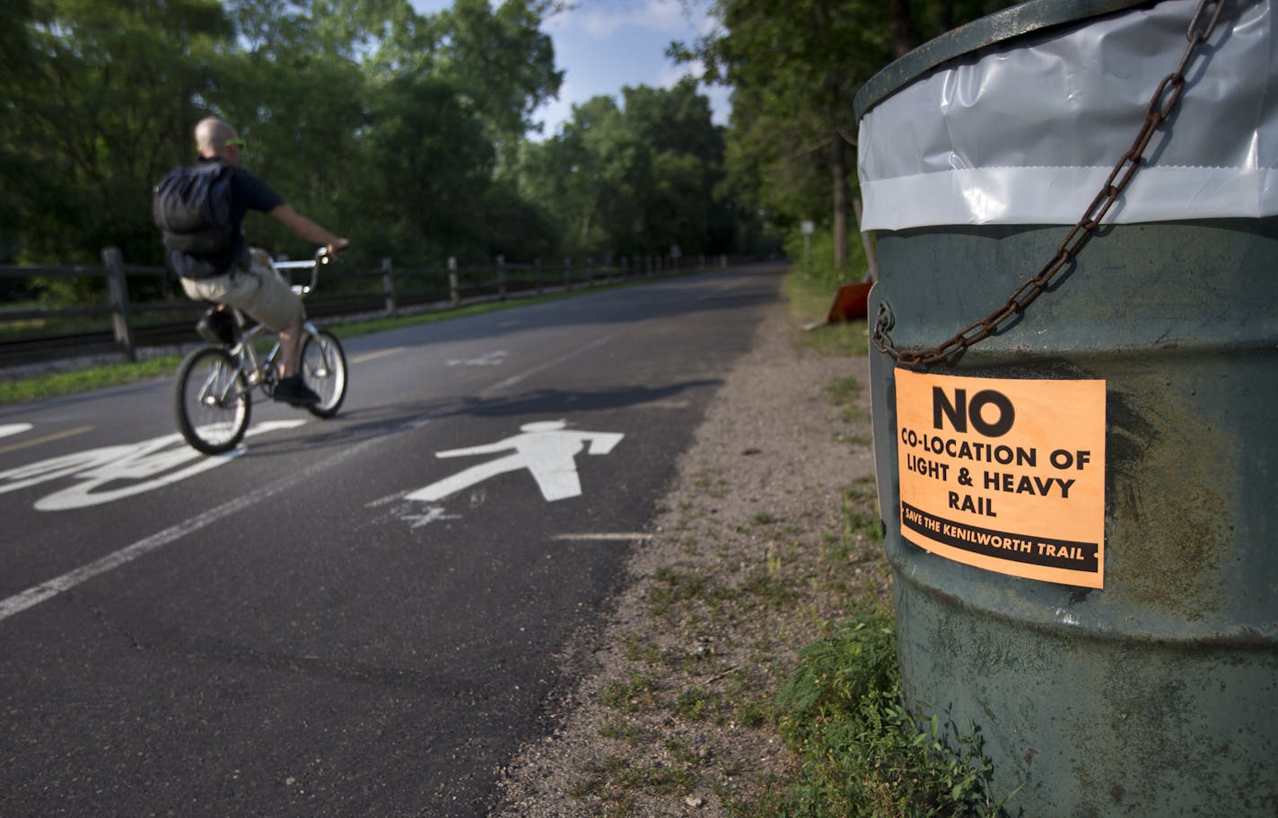 The Cedar Lake Trail sits alongside a current freight train track that has been a proposed site for the Southwest Corridor light rail line in St. Louis Park. One proposal would have the LRT move through the area in a tunnel under the freight line and could cost $100 million.